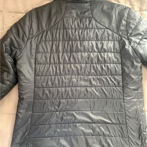 This is a woman’s large . Very nice shape . Soft warm . Winter jacket.
